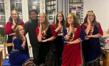 Group of women tourists wearing traditional Nepali dress in Ghandruk village