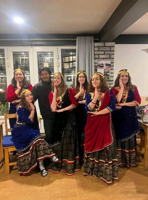 Group of women tourists wearing traditional Nepali dress in Ghandruk village