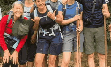 Hikers on Ghorepani Poon Hill Trek, Nepal, pose for a group photo.