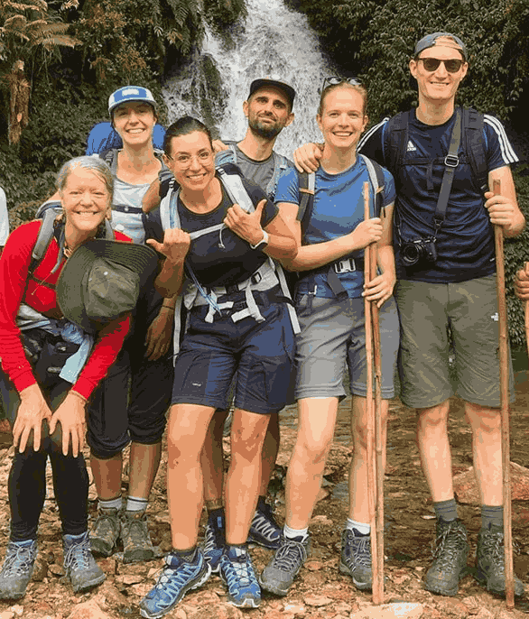 Hikers on Ghorepani Poon Hill Trek, Nepal, pose for a group photo.
