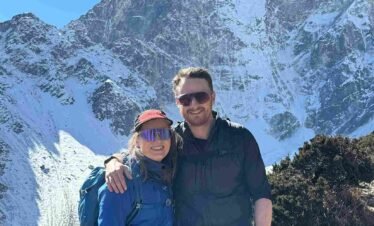 British couple hiking towards Cho La Pass in the Everest region of Nepal