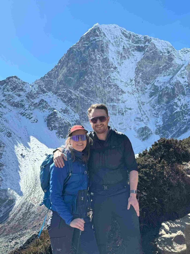 British couple hiking towards Cho La Pass in the Everest region of Nepal